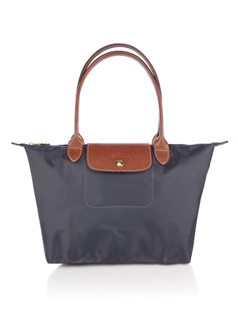 longchamp tassen bijenkorf